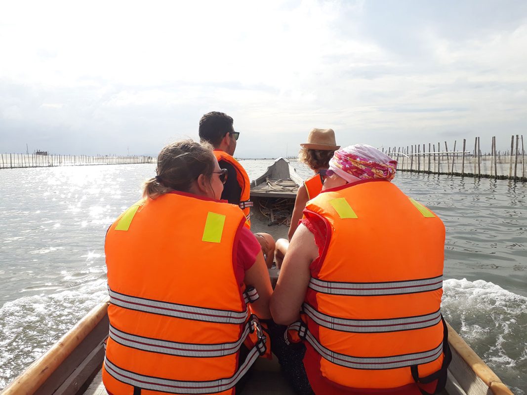 Tourists experience at Tam Giang lagoon