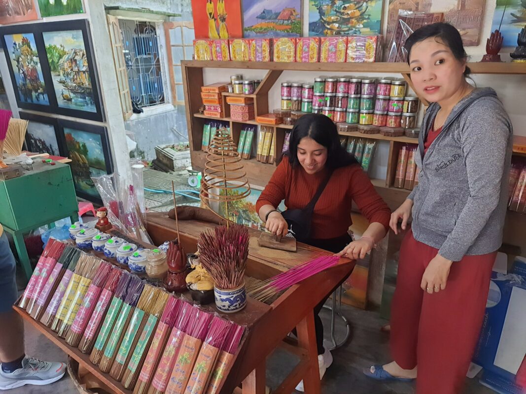 Tourists experience the traditional craft of making incense