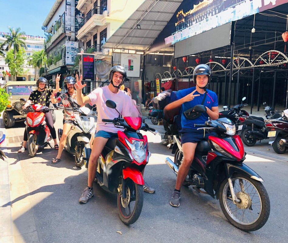 Tourists rent motorbikes to drive themselves