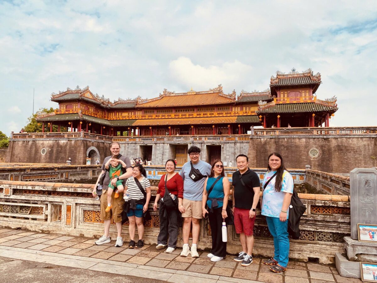 Tour group visiting Hue Citadel on Chan May Port to Hue Private Tour
